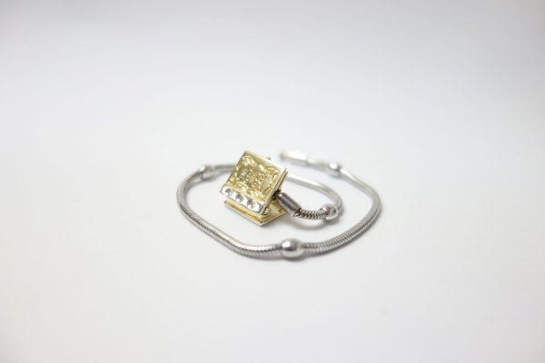 14Kt Gold, Silver And Diamonds Storyweels Charm Bracelet